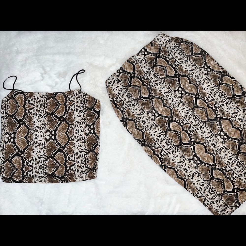 Going out pencil skirt with crop top leopard print. Never worn & no tears.